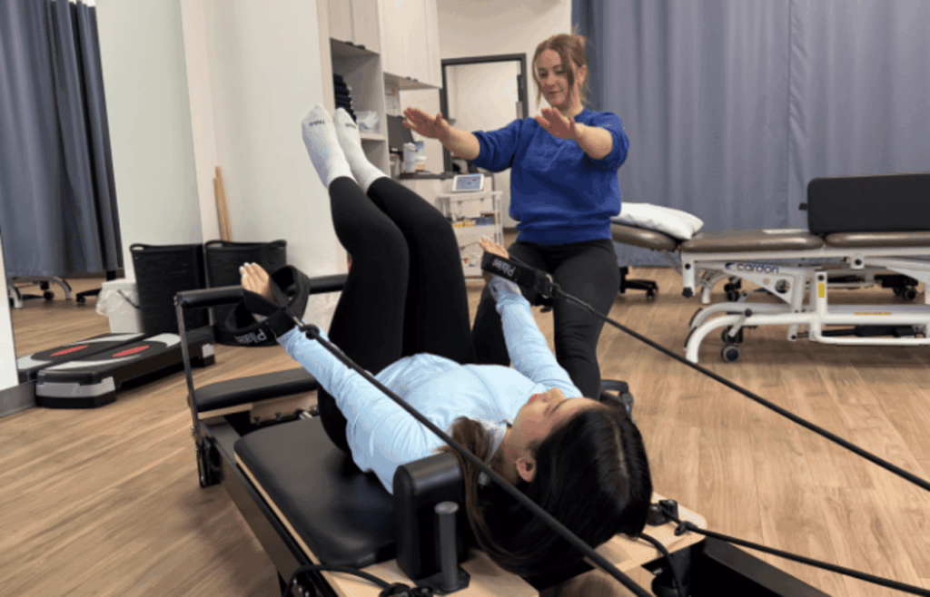 pilates program client and therapist